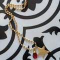 Star charm with red pendant necklace