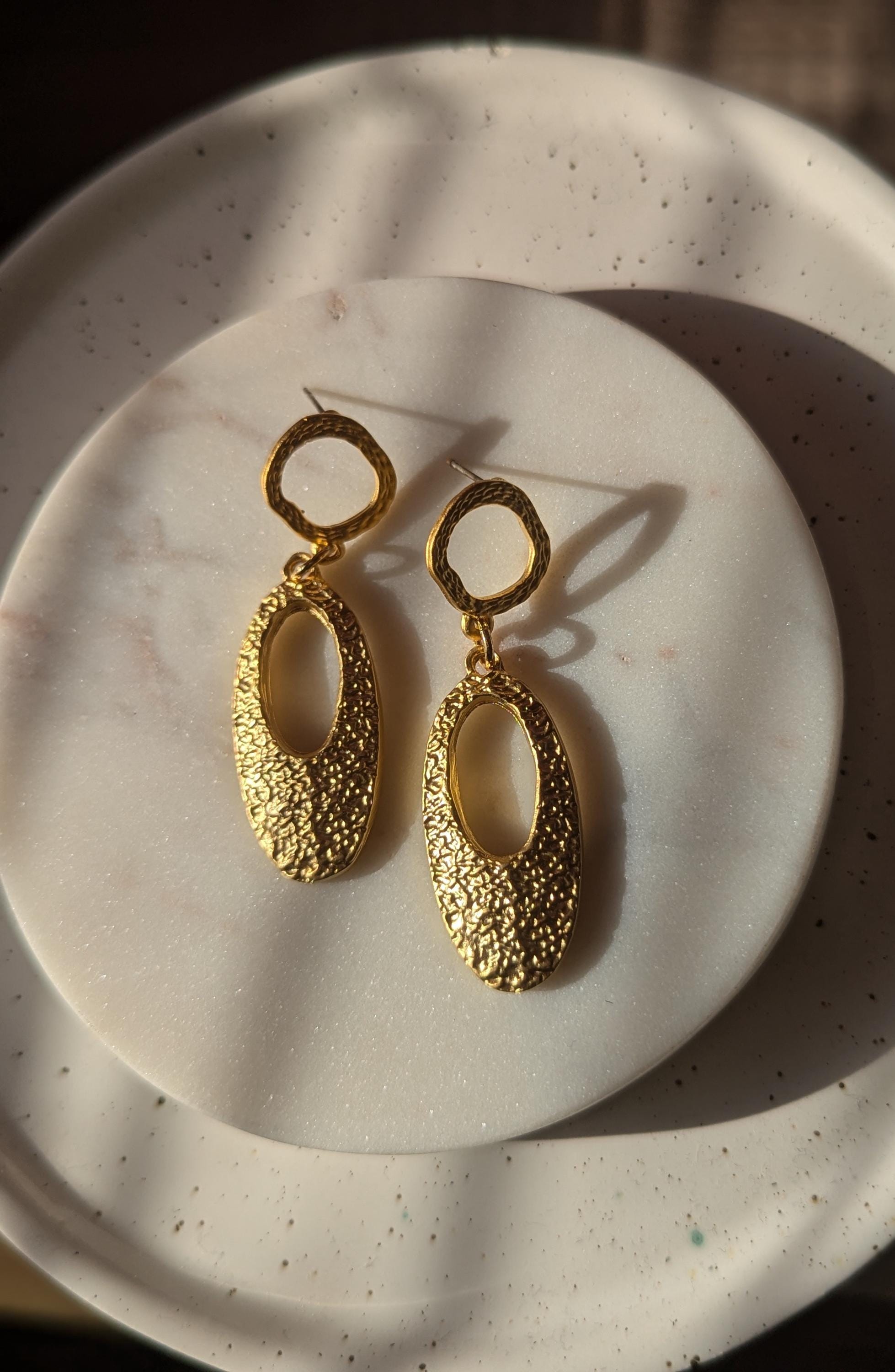 Medium gold dangle earrings