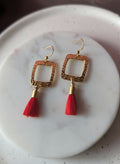 Gold Square drop earrings with red tassel.