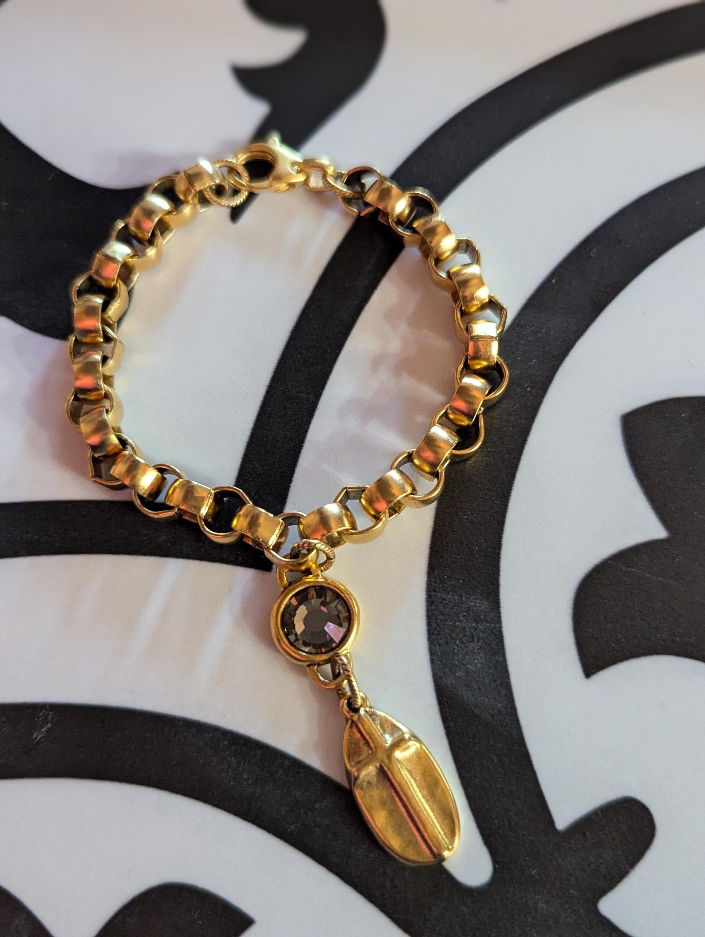 Swarovski crystal and cross chain link bracelet.