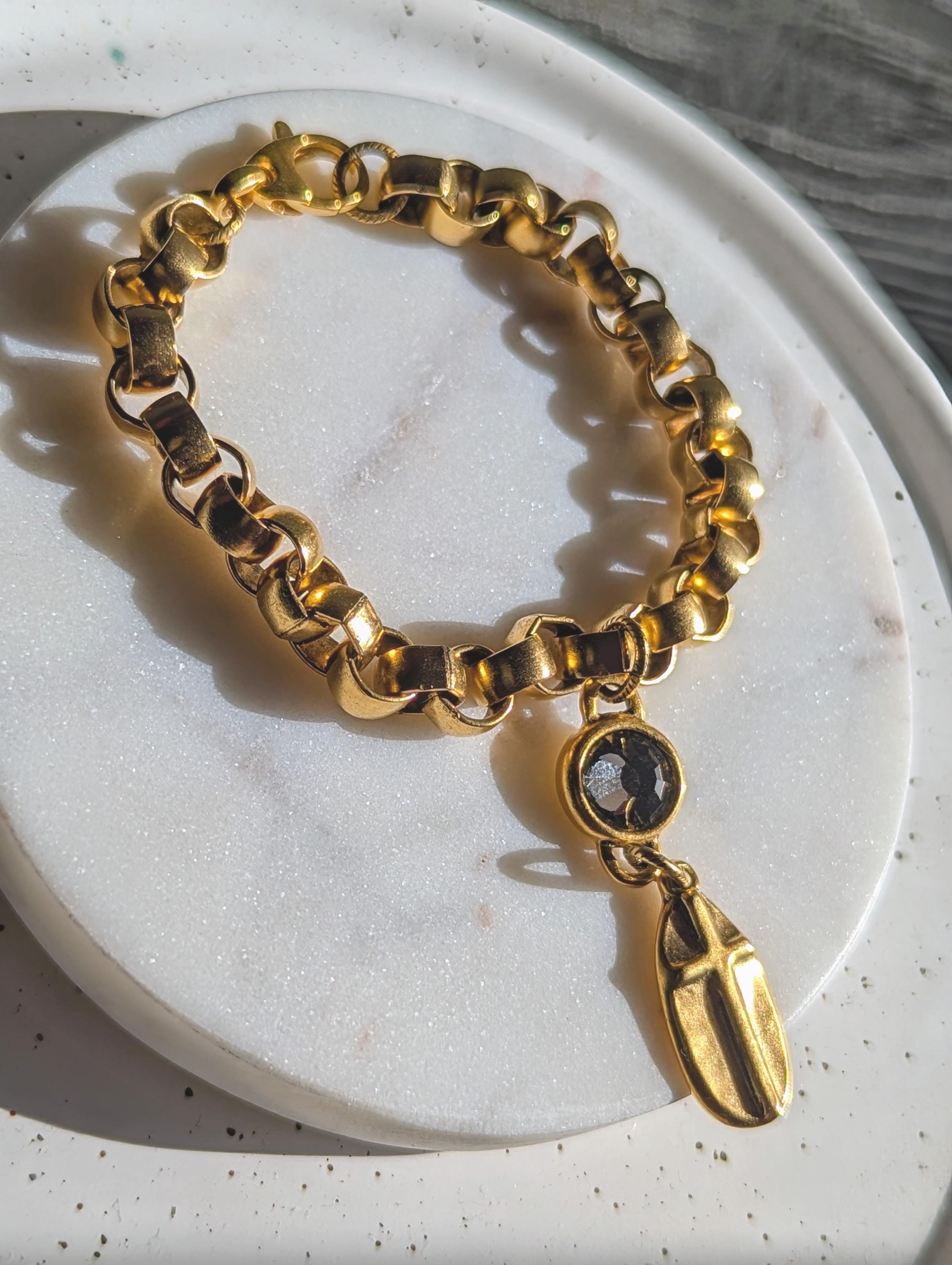 Swarovski crystal and cross chain link bracelet.