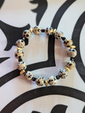 Dalmatian Jasper stretch bracelet with Gold accents and black spinel
